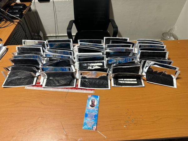 DNCD y CESAC frustran intento de envío de cocaína camuflada en recordatorios para difuntos